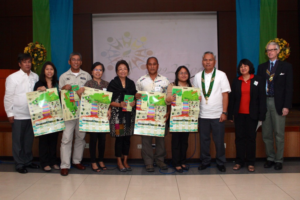 FPE members and partners pose for the camera with the Results Posters of the newly launched RSEA Guidebook, highlighting the landmark 22nd anniversary event. From left to right: Mr. Godofredo T. Villapando, Jr., Executive Director of FPE; Ms. Lia Jasmin Esquillo, former Executive Director of Interface Development Interventions, Inc.; Mr. Dennis Salvador, Executive Director of Philippine Eagle Foundation; Dr. Juliet Ceniza, Project Director for USAID-FPE project of Visayas State University-Visca Foundation for Agriculture and Rural Development, Inc.; Dr. Paciencia Milan, Chair of the Philippine Tropical Forest Conservation Foundation Inc.; Mr. Calixto Yao, NRM Specialist of Cebu Biodiversity Conservation Foundation Inc.; Ms. Lea Jim Villanueva, Programme Manager of Polillo Island Biodiversity Conservation Foundation Inc.; Mr. Nestor R. Carbonera, Chair and CEO of the FPE Board of Trustees; Ms. Alma Monica A. dela Paz, former FPE Chair (1998-2000); and Mr. Winston Bowman, Acting Director of the Office of Energy, Environment, and Climate Change of USAID.
